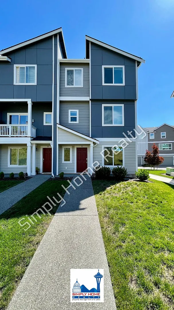 Step Inside to a Townhome Made for Easy Living! — Photo 1
