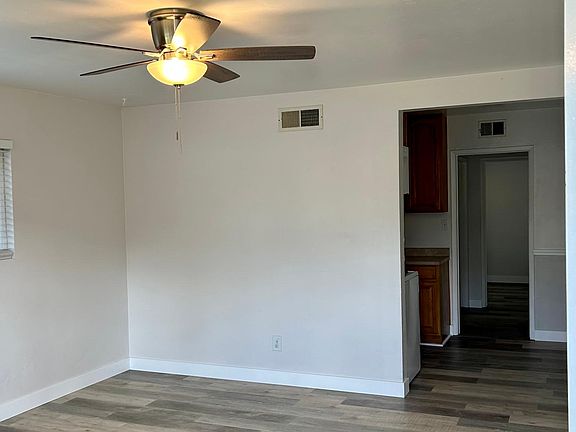 View from front entrance into the large living room and beyond