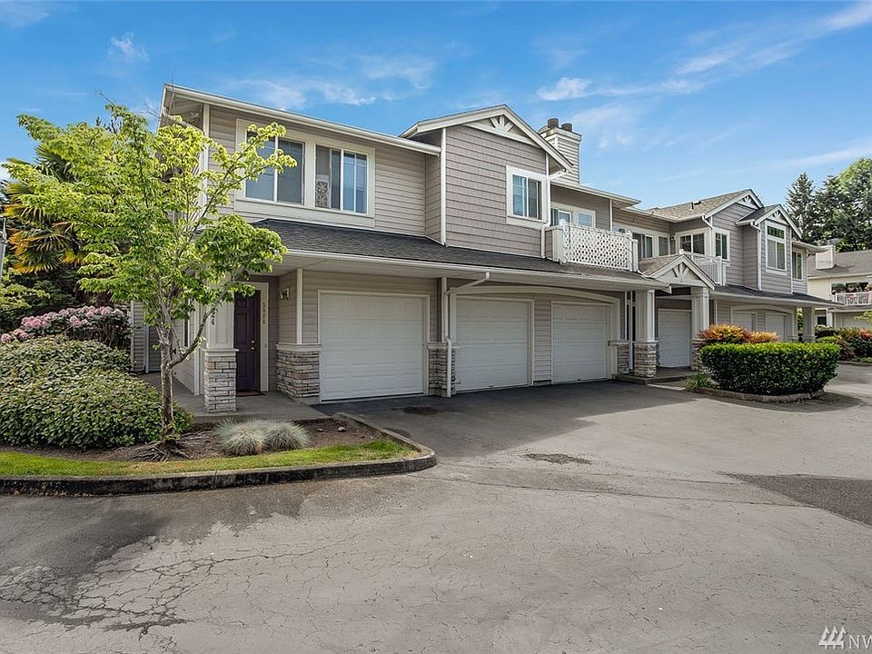 Welcome home to Harbor Reach at the Lakes! Delight in this 2 bedroom, 2 bath condo with 9' ceilings, an open and airy floorplan and attached 1-car garage. This popular layout features a spacious open kitchen with a breakfast bar overlooking the dining area and living room with tall windows, elegant crown molding and lovely wood burning fireplace. A glass French door leads to a sunny deck for your enjoyment. The roomy master suite boasts a large walk-in closet and ensuite bath with a dual vanity and large soaking tub. Harbor Reach also features a private club house with a workout room, common area with kitchen, hot tub and more. Enjoy all the benefits of home ownership with the convenience of the condo lifestyle. 