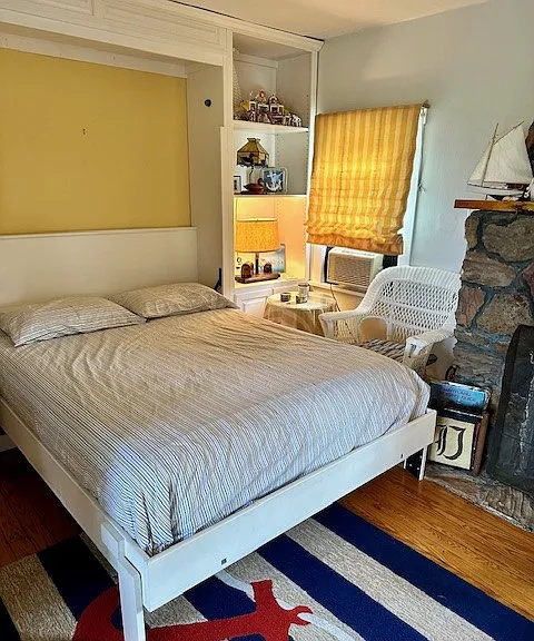 2 Queen size murphy beds in living room
