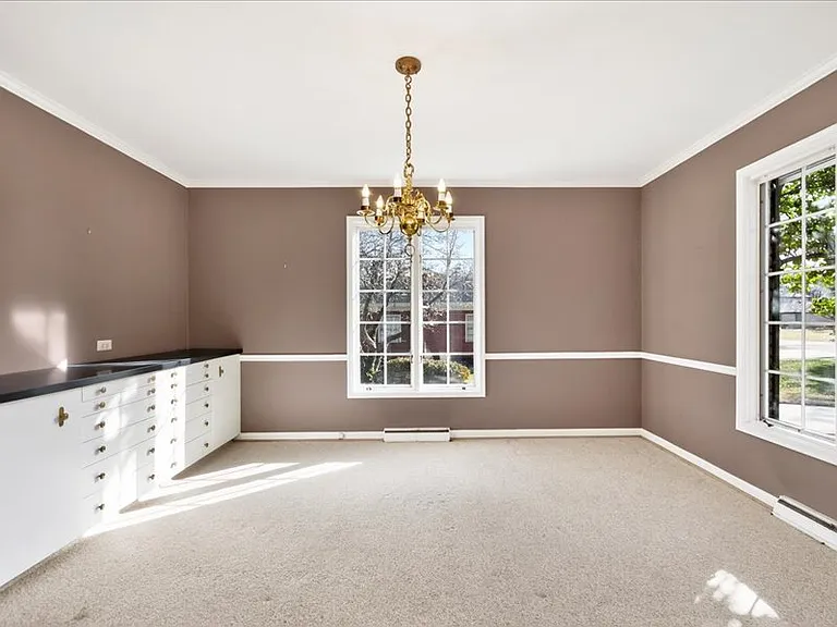 Dinning room with built-ins for extra storage.