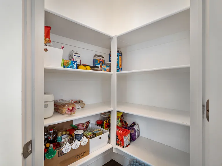 Corner pantry in kitchen.
