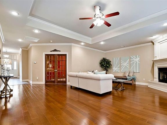 Another view of the main living space & entry to Office through pretty French doors...