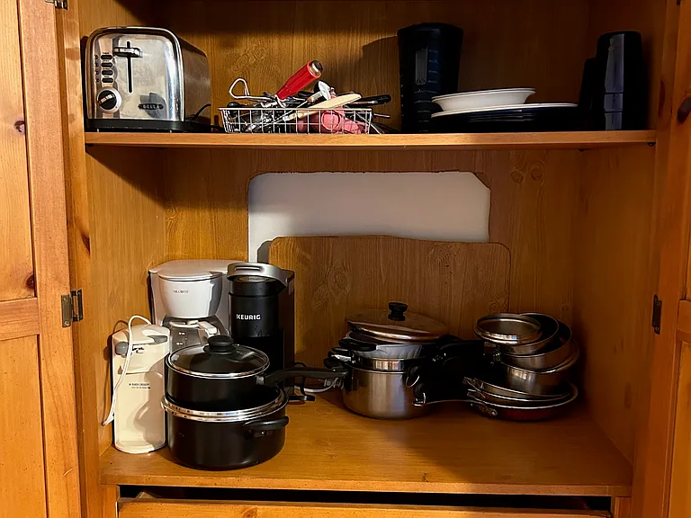 Coffee maker, toaster, pots and pans, and dishes provided