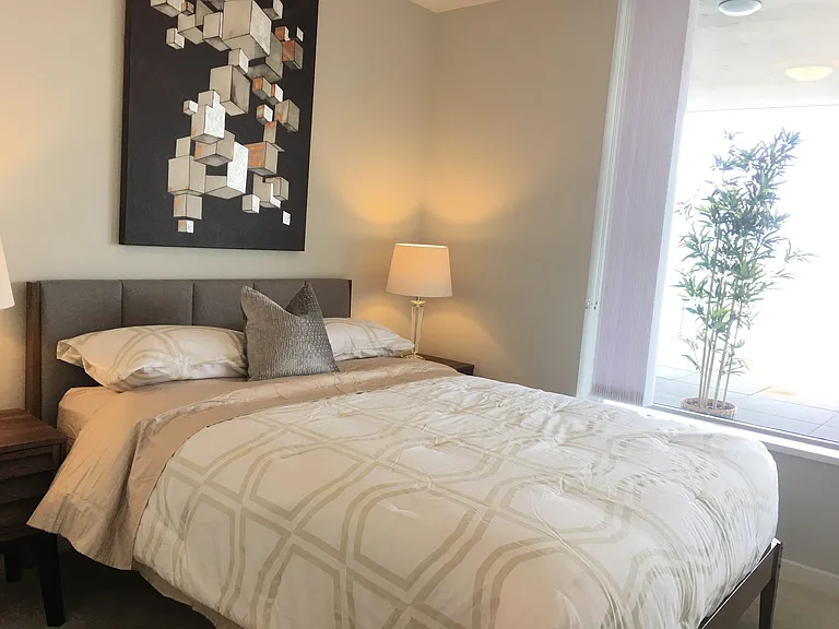 1st bedroom with view of the terrace.