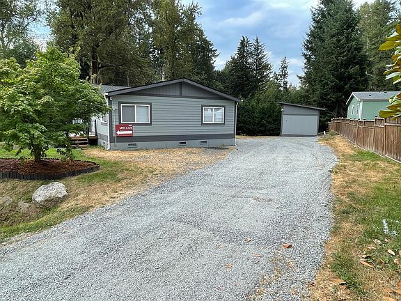 side of house, driveway and parking