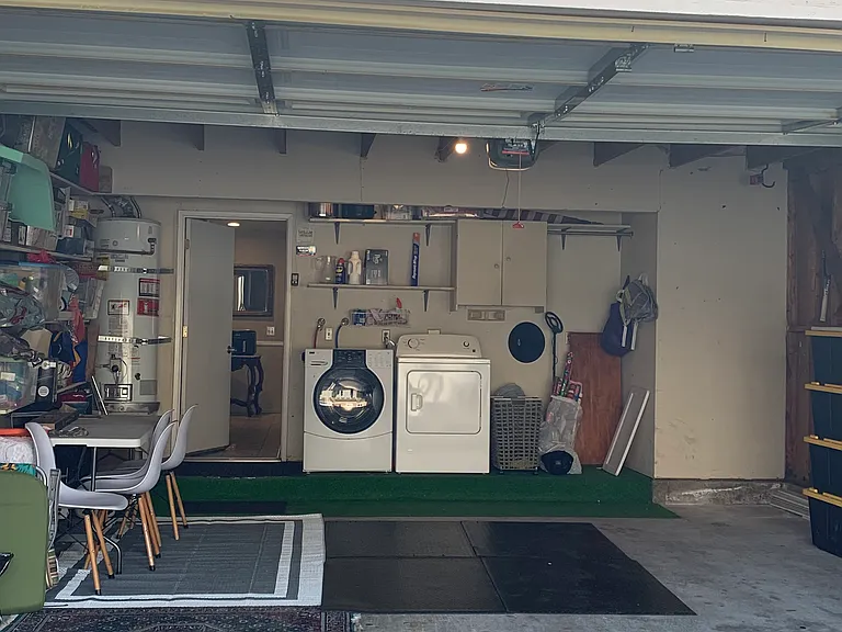Full size washer and dryer and full size refrigerator included in the 2-car garage. Direct access to the kitchen from the garage.