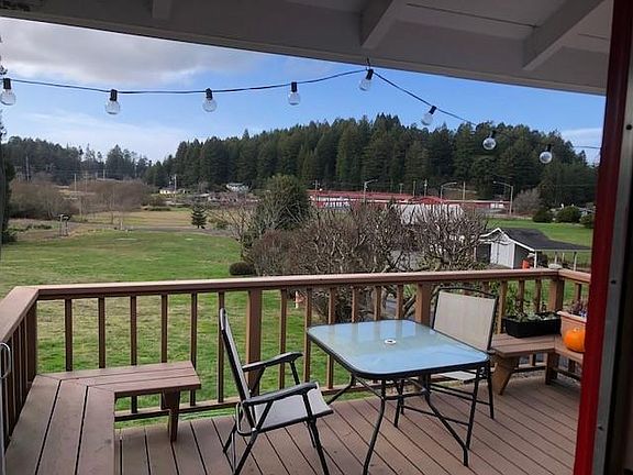 Front porch of house looking out toward the property.
