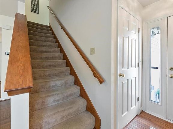 Welcoming entry with spacious coat closet.