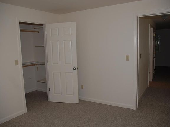 bedroom with walk-in closet
