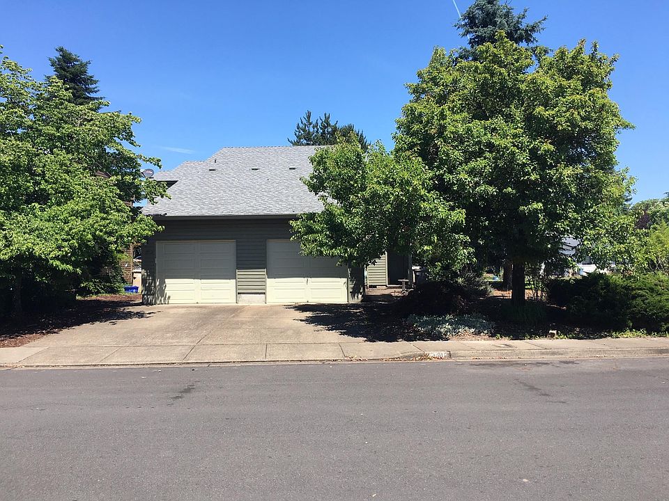 1743 NW Grant Circle is the left side. It's part of a duplex
