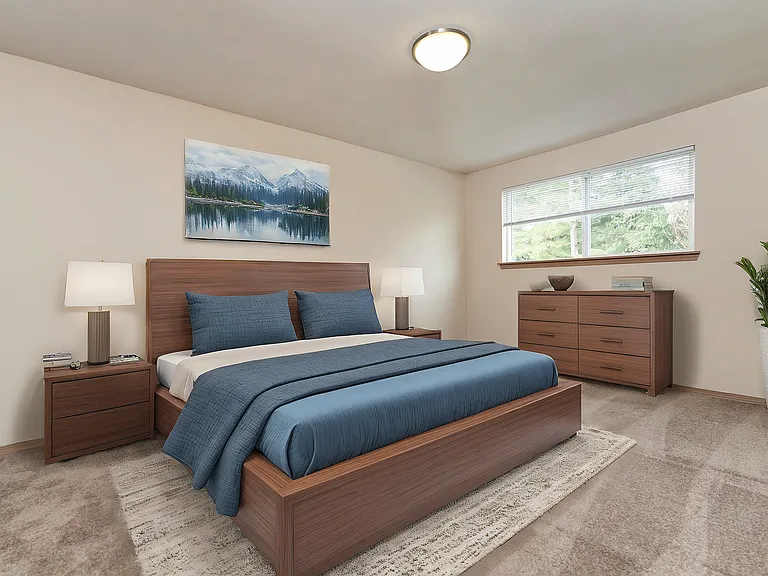 Unwind in this serene bedroom, featuring modern elegance and natural light.