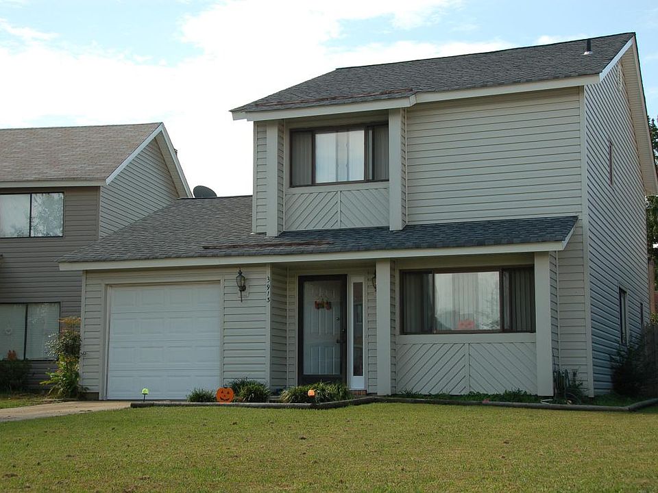 Single family detached home with fenced in back yard