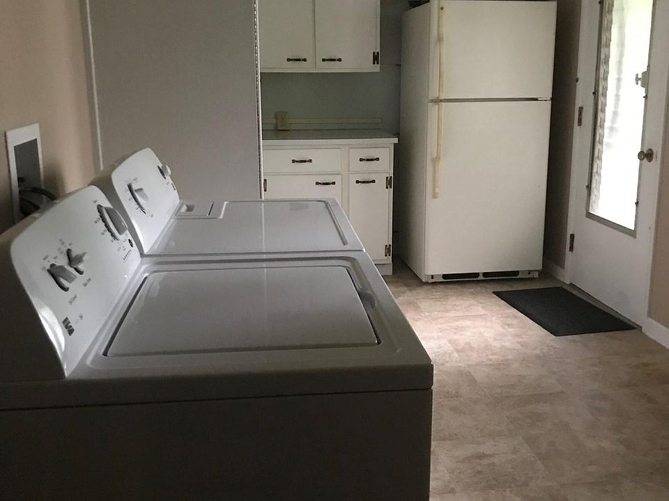 Laundry room with 2nd frig.