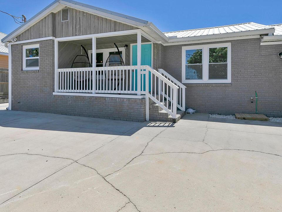 Front view. The entrance to the unit is on the LEFT from the porch