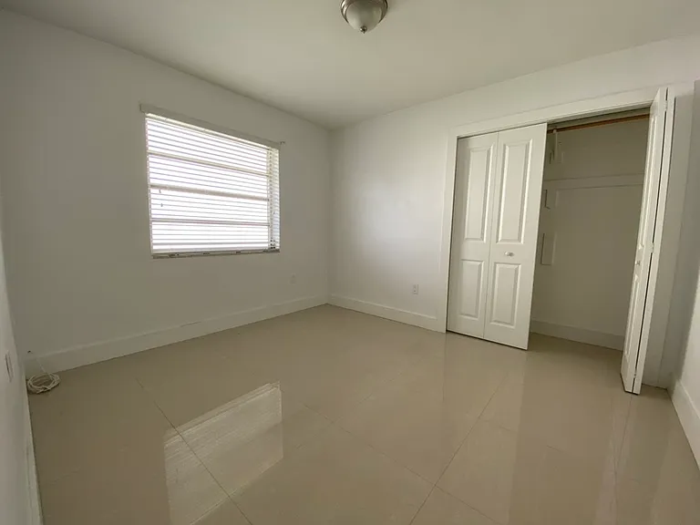 bedroom with closet