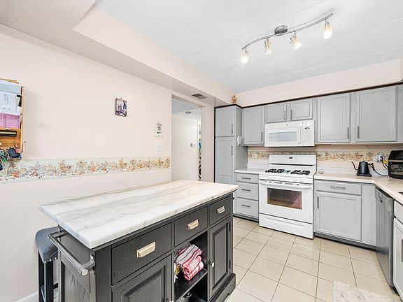 4th image of 5780 W 76th Pl APT 1-B
