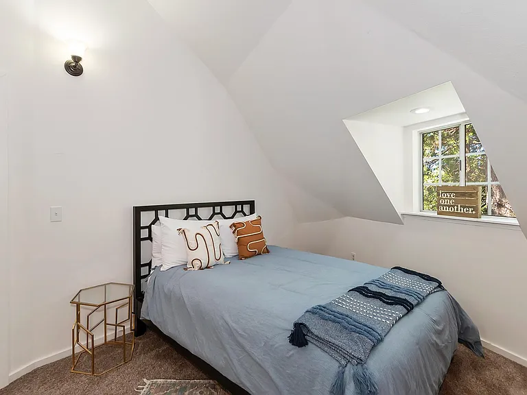 Upstairs bedroom with queen bed