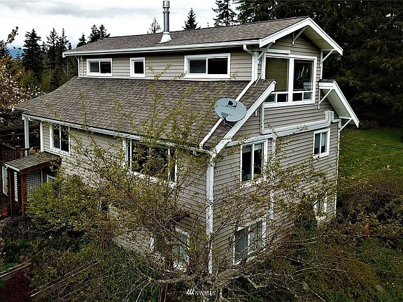 Back side view of this 2 story with full basement