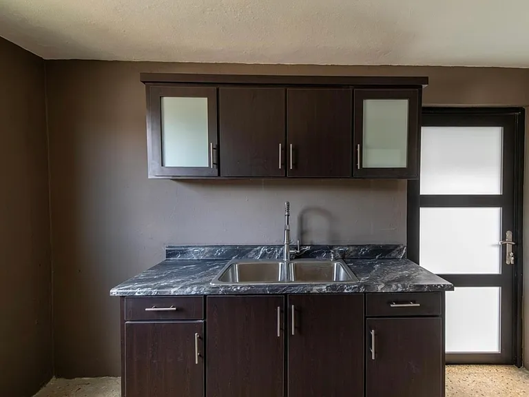 1 Avenida #65 — Photo 1