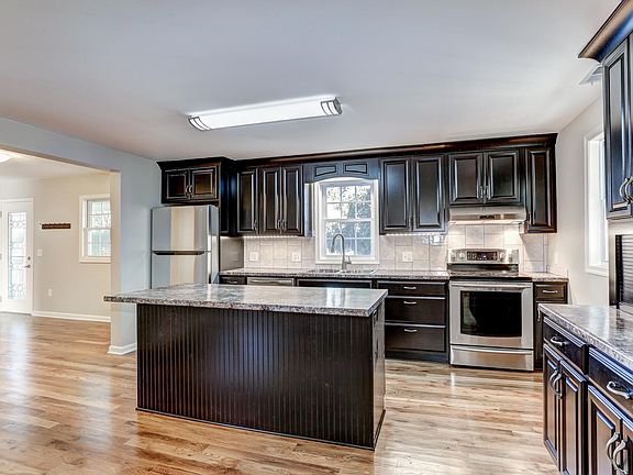 Picture from main 36 inch wide door across kitchen to 2nd exterior door in Living room