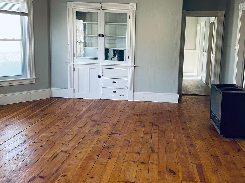 Large formal dining room with loads of natural light