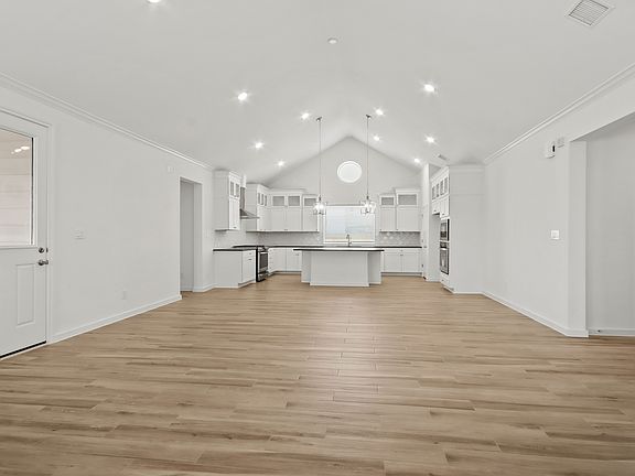 Great room with vaulted ceiling