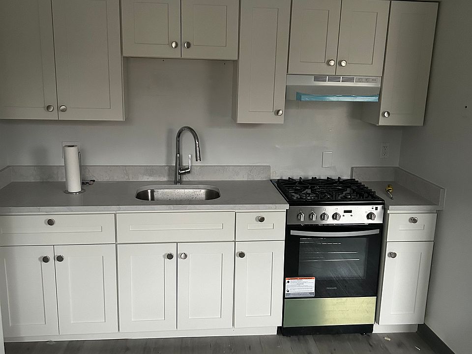 kitchen with new stove and cabinets