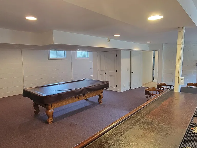 Lower lwevel family room. Pool table must stay in place. Everything else can be removed