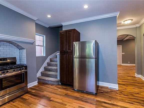New refrigerator and gas oven.   Butler stairs to the second floor.