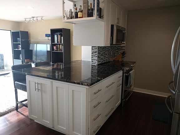 Oversized, granite countertops makes the space great for cooking