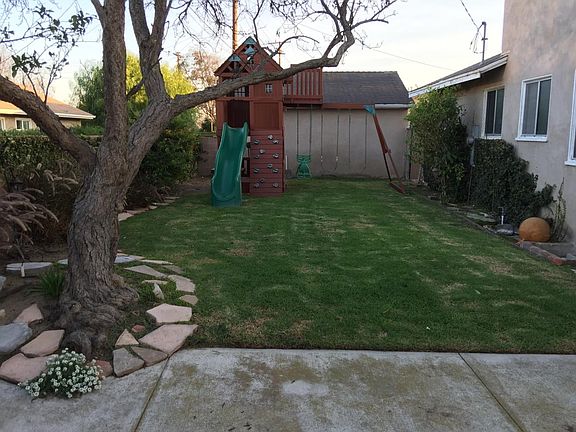 back yard with play structure