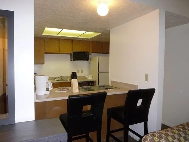 View of the kitchen. Only Top Floor Units Come with Microwav