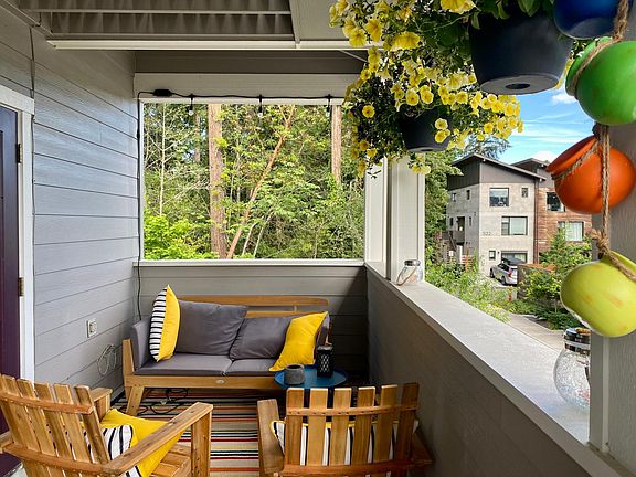 Large deck area off of main living space. There are two additional outdoor seating areas in the unit.