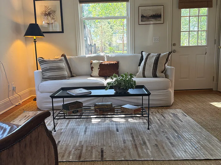 Living room with tall ceilings and abundant light