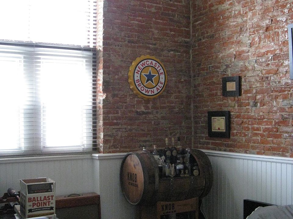2nd bedroom with exposed Brick