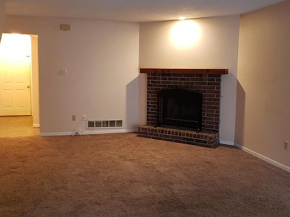 Living room showing the beautiful fireplace