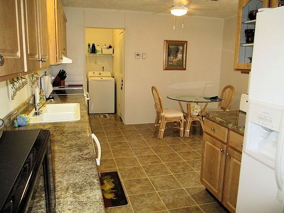 Kitchen toward Laundry rm