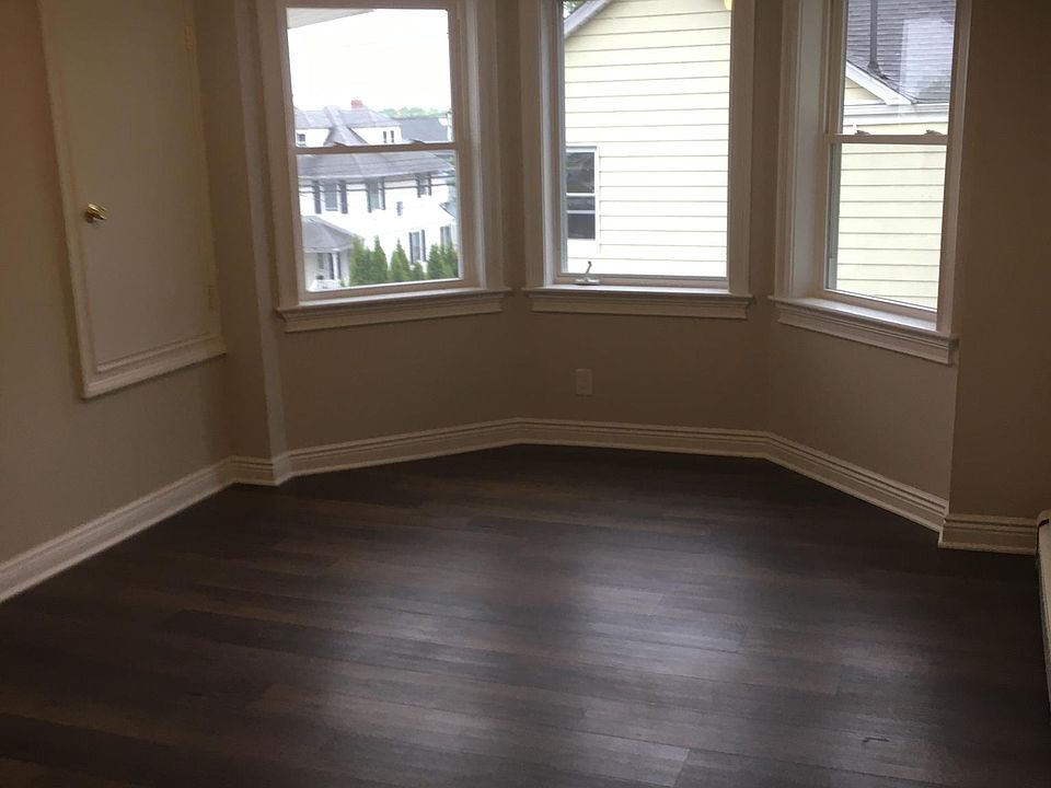 Large Living room. 3 corner windows.