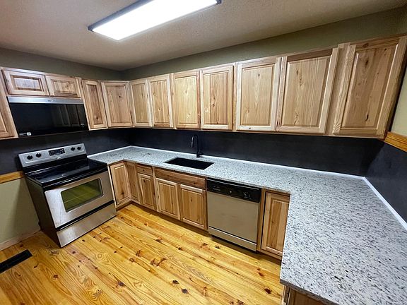 3rd image of 6980 Farm Road 115 #A
