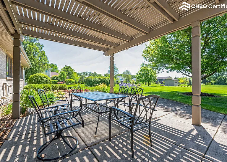 Patio - Pergola balances sun inside & out, & near flowerbed