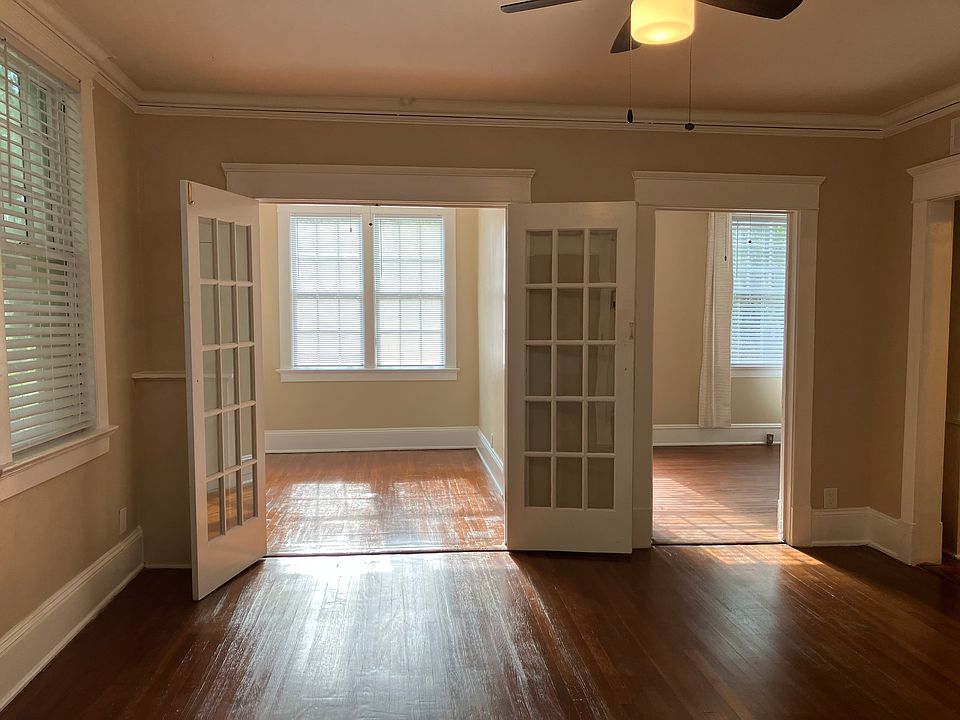 View from entry into living area - extra room has french doors