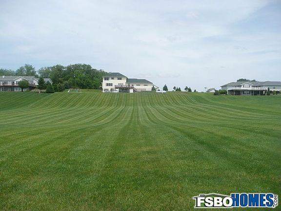 Backside view of the house from the end of acreage property.