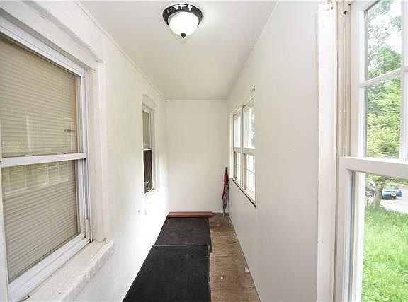Enclosed porch on main level.