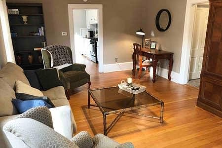 Original hardwood floors in living room and kitchen.