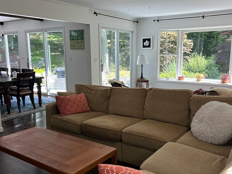 Living room open floor plan leading to sitting room, dining room and kitchen.