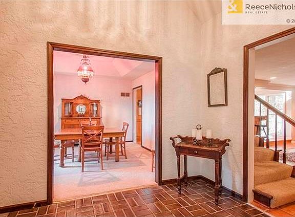 Tile entry opens to living room, dining room and great room