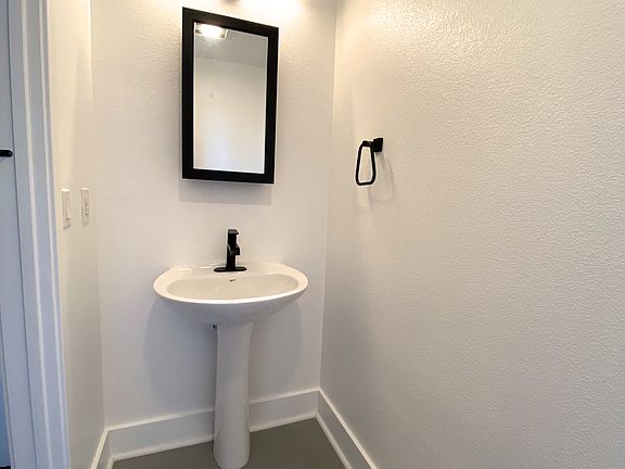 Half bath on the main floor beside the dining room.