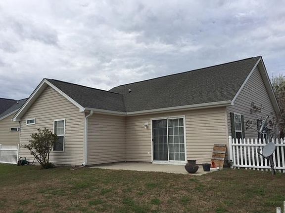 Rear view showing patio