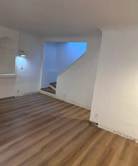 Living room with coved ceilings